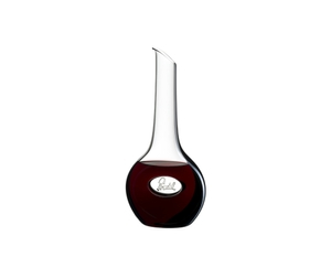 RIEDEL Decanter filled with a drink on a white background