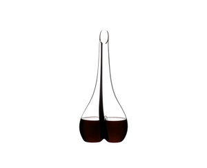 RIEDEL Black Tie Smile Decanter filled with a drink on a white background