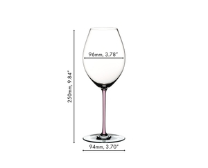 A RIEDEL Fatto A Mano Syrah glass in pink filled with red wine on a white background. 