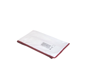 RIEDEL Vinum + Gift filled with a drink on a white background