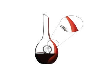 A RIEDEL Chinese Zodiac Tiger Decanter Red filled with red wine on a white background. 
