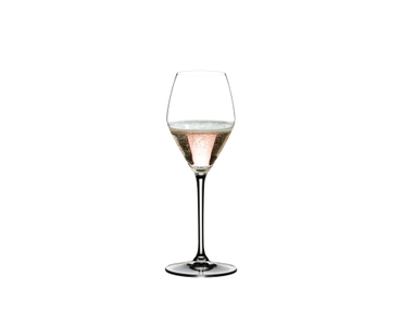 RIEDEL Extreme Rosé Wine/Rosé Champagne Glass filled with a drink on a white background