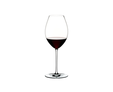 A RIEDEL Fatto A Mano Syrah glass in white filled with red wine on a transparent background. 