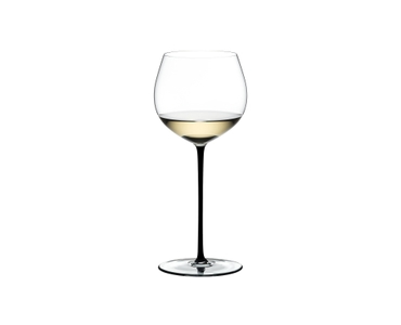 A RIEDEL Fatto A Mano Oaked Chardonnay glass in black filled with white wine on a transparent background. 