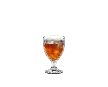 RIEDEL Tumbler Collection Fire All Purpose Glass filled with a drink on a white background