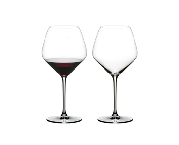 RIEDEL Extreme Pinot Noir filled with a drink on a white background