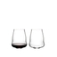 Two SL RIEDEL Stemless Wings Pinot Noir/Nebbiolo glasses on a transparent background. The SL RIEDEL Stemless Wings Pinot Noir/Nebbiolo glass on the left side is filled with red wine, the other one is unfilled. 