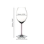 A RIEDEL Fatto A Mano Syrah glass in pink filled with red wine on a white background. 