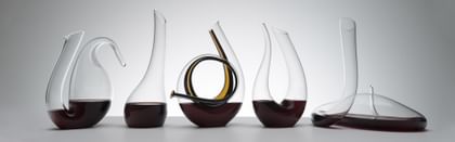Various RIEDEL decanters lined up