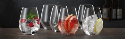 RIEDEL stemless glassware with various fruits in them