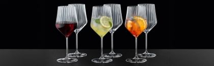 Aperitivo sprits red wine glasses lined up
