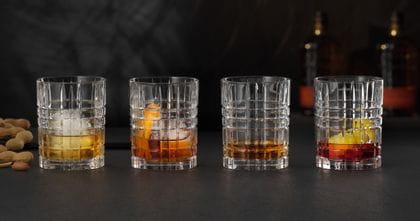 Four NACHTMANN Square Whiskey tumblers filled with different alcoholic and non-alcoholic drinks.<br/>