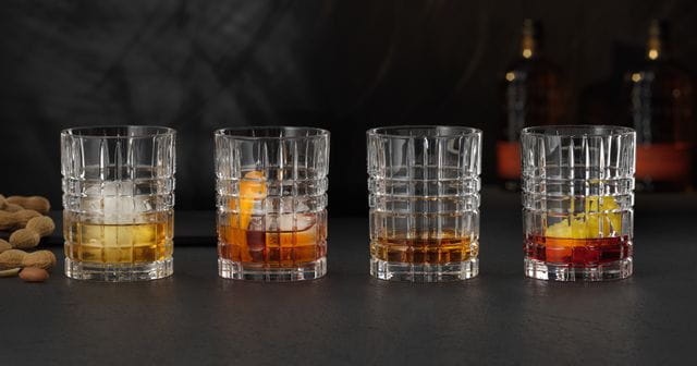 Four NACHTMANN Square Whiskey tumblers filled with different alcoholic and non-alcoholic drinks.<br/>